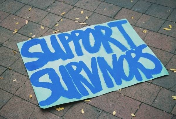support-survivors-sign